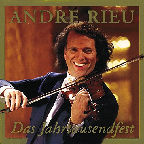 Andre Rieu smiling, playing violin on CD cover, gold lettering.