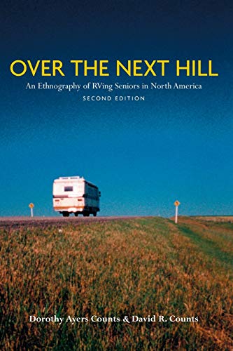 Book cover: RV on a hill with golden field, blue sky.