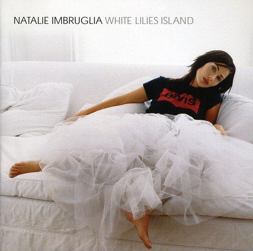 Natalie Imbruglia album cover: woman in black t-shirt and white tulle.