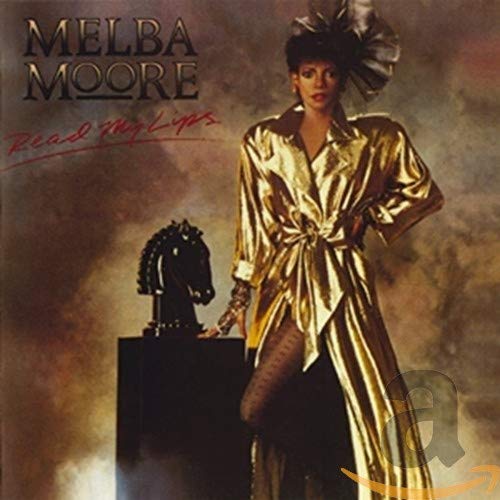 Melba Moore album cover: gold robe, horse statue, dramatic lighting.