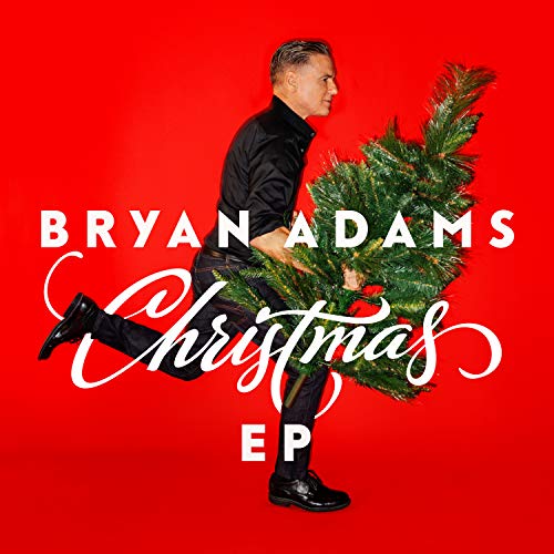 Bryan Adams album cover with artist carrying a Christmas tree.