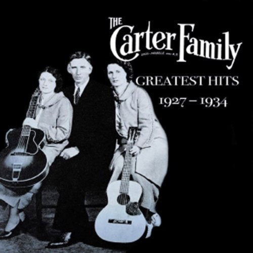 Black and white photo of The Carter Family with guitars, CD cover.