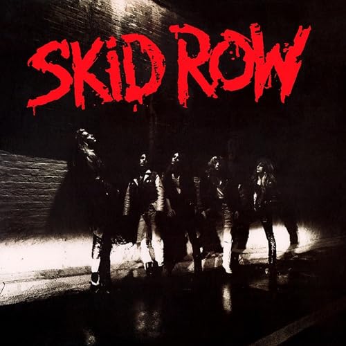 Skid Row album cover with band members silhouetted in dark lighting.