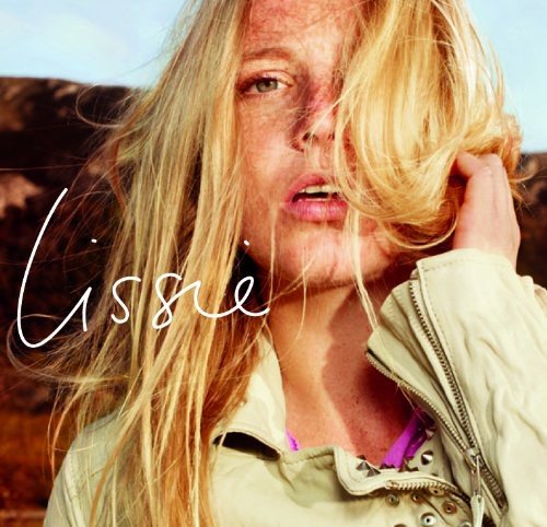 Lissie album cover: close-up of a blonde woman with windswept hair.