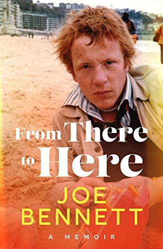 Book cover: young man on a beach, title “From There to Here” by Joe Bennett.
