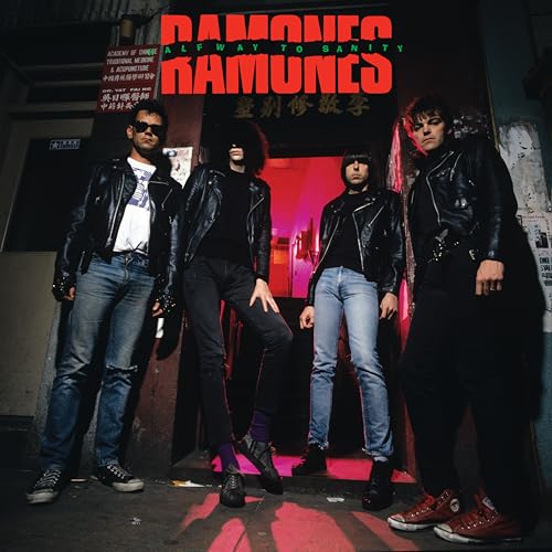 Album cover featuring four men in black leather jackets standing in a city alley.