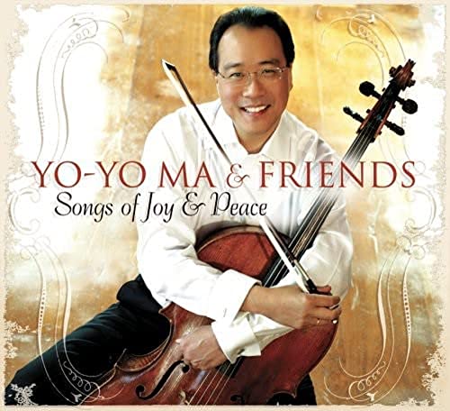 Yo-Yo Ma smiling and holding a cello on the album cover.