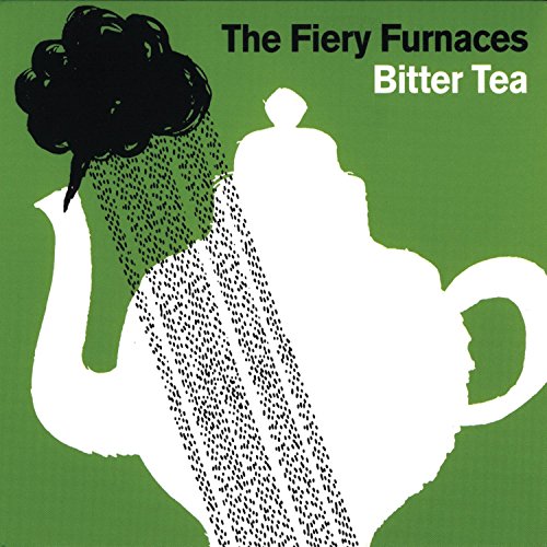 Green background with a white teapot pouring black, speckled tea.