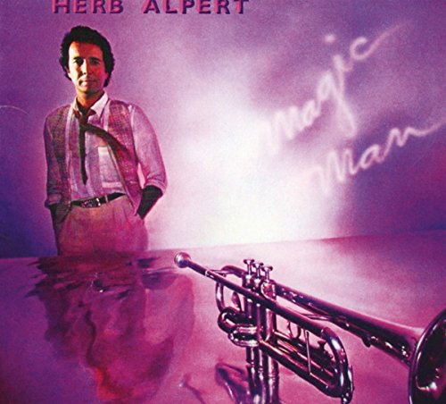 Herb Alpert album cover featuring the artist and a trumpet reflection.