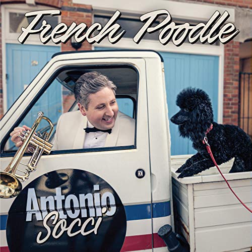 Man with trumpet and black poodle beside a vintage van.