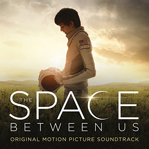 Soundtrack album cover featuring a young man in a spacesuit holding a helmet.