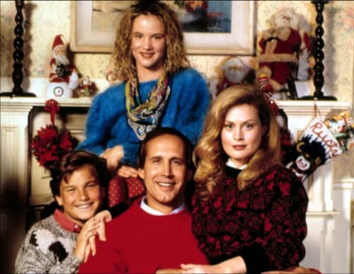 Family portrait from "National Lampoon's Christmas Vacation" with holiday decorations.