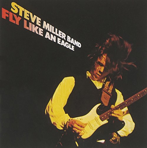 Steve Miller Band album cover featuring a man playing guitar.