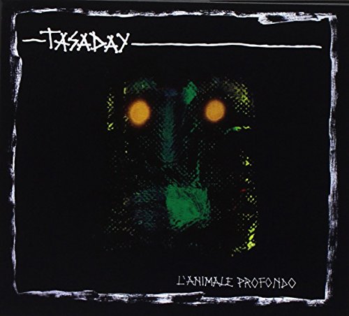 CD cover: dark background with glowing animal eyes and text.