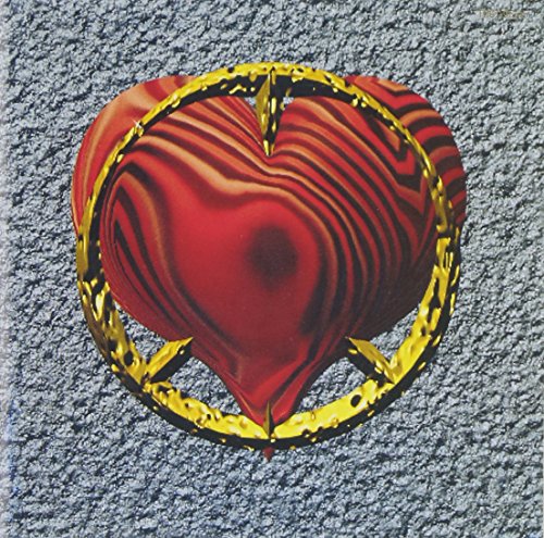 Red heart with gold trim on a textured gray background.