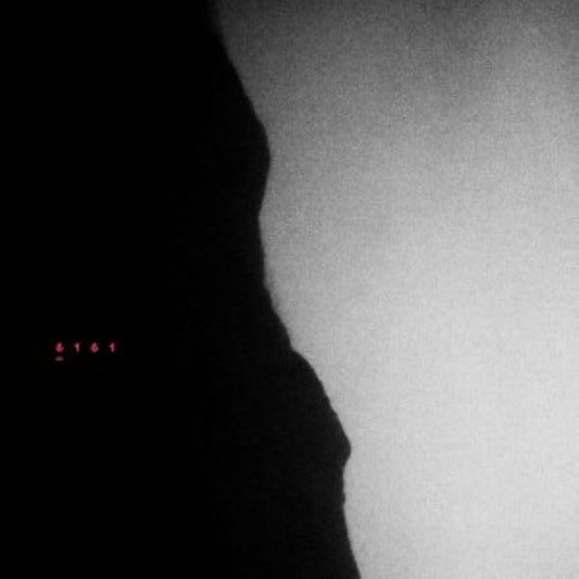 Black and white abstract image with red "6161" text in the corner.