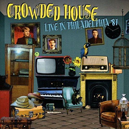 Crowded House album cover: a cluttered room with portraits and objects.