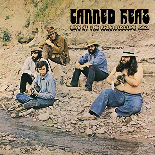 Canned Heat album cover: four men with hats seated outdoors.