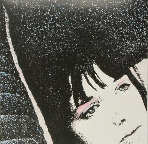 Close-up of a woman’s face in black and white pop art style.