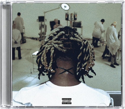 CD case for Ken Carson’s “xperiment” album, featuring a man with dreadlocks.