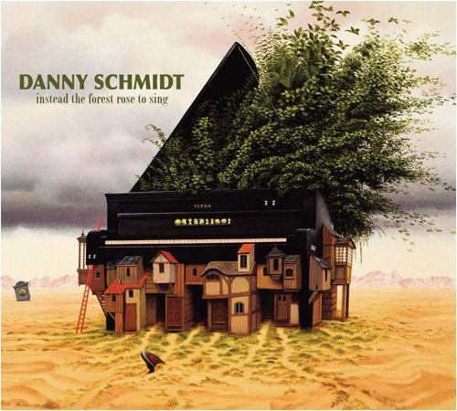 Surreal painting of a piano overgrown with trees and houses in a desert landscape.