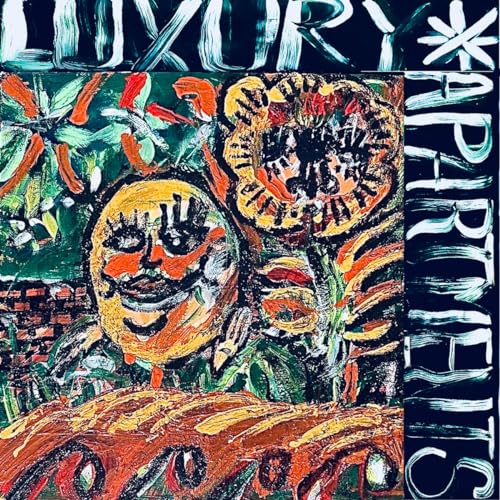 Album cover with abstract, colorful painting of a face and flowers.