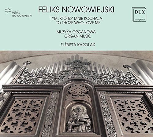 CD cover featuring ornate organ pipes and a sculpted religious figure.
