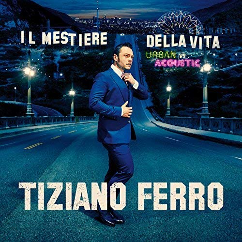 Tiziano Ferro album cover featuring the artist on a bridge at night.