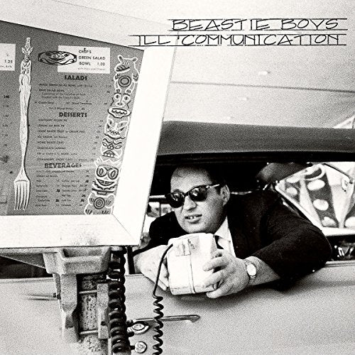 Black and white album cover for Beastie Boys’ “Ill Communication” featuring a diner scene.