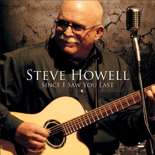 Steve Howell album cover: man with guitar and vintage microphone.