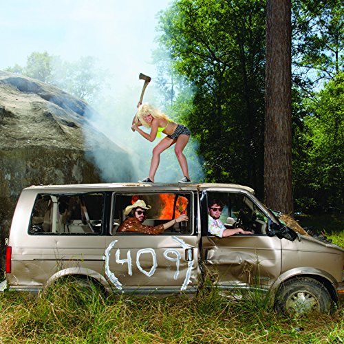 People with a van amidst smoke and trees, number "409" visible.