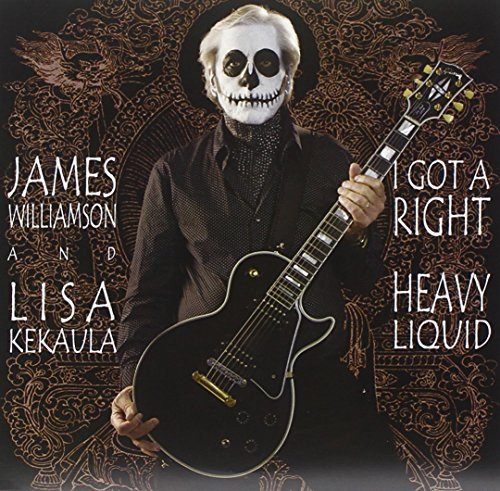 Man in skull makeup holding a black electric guitar.
