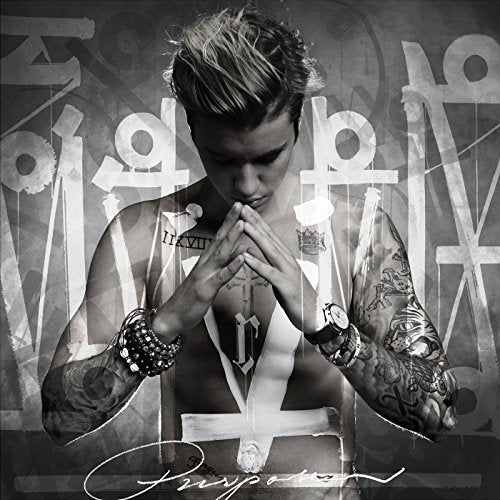 Justin Bieber album cover, "Purpose," with a grayscale, textured design.
