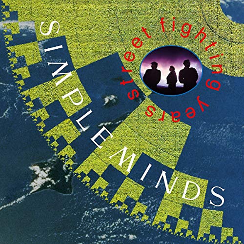 Simple Minds "Street Fighting Years" CD cover with band silhouettes.