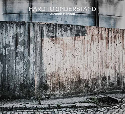 CD cover for "Hard to Understand" by Jaromír Honzák, featuring a concrete wall.
