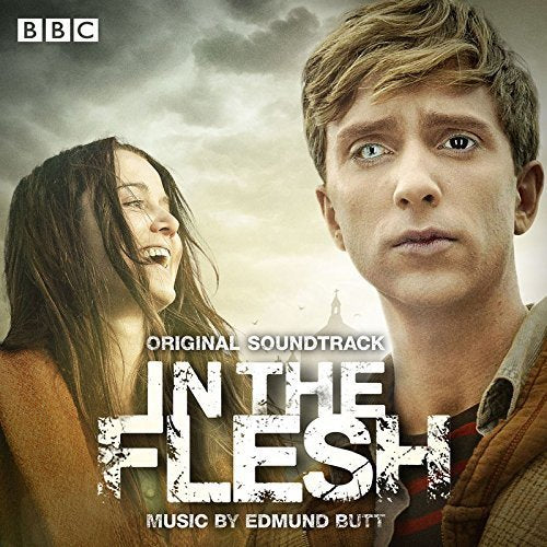 CD cover for “In The Flesh” soundtrack featuring two people and a castle.