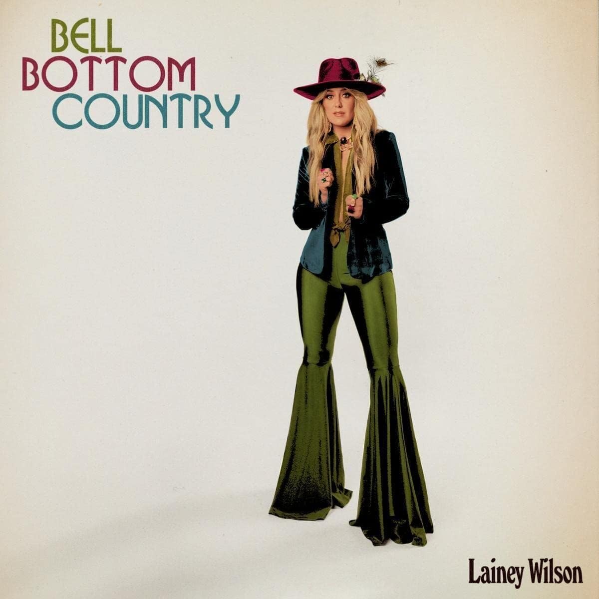 Vinyl record cover featuring Lainey Wilson wearing a hat against a desert landscape background.