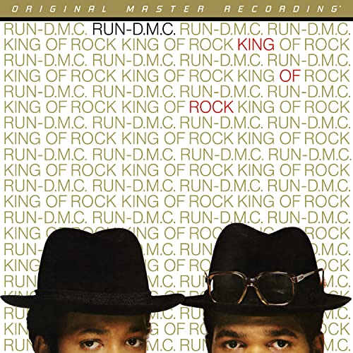 CD cover for Run-DMC’s “King of Rock” featuring the group in hats and sunglasses.