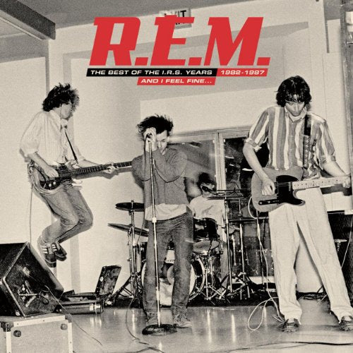 R.E.M. album cover: black and white photo of the band performing.