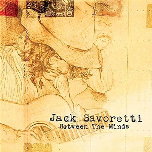 Cover of Jack Savoretti's "Between The Minds" CD featuring a close-up of his contemplative face.
