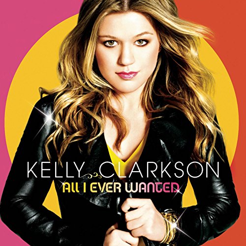 Album cover of Kelly Clarkson in a black leather jacket against a yellow circle.
