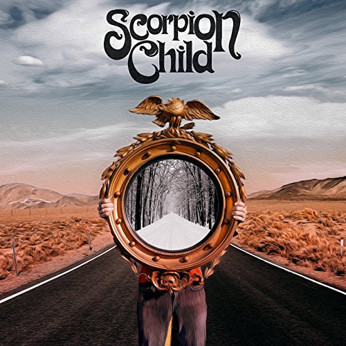 Album cover: desert landscape with a person holding a framed forest view.