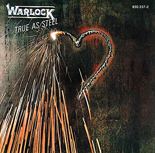 Warlock album cover: welding sparks forming a heart shape on black.