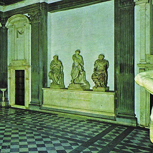 Three classical statues in a marbled alcove with a checkered floor.