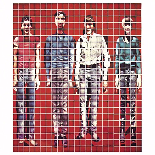 Talking Heads album cover: four band members overlaid on a red grid.