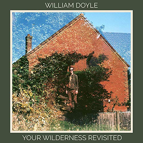 CD cover: red brick house with a man standing in foliage.