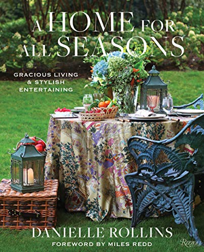 Book cover showing a floral outdoor table setting with a large flower arrangement.