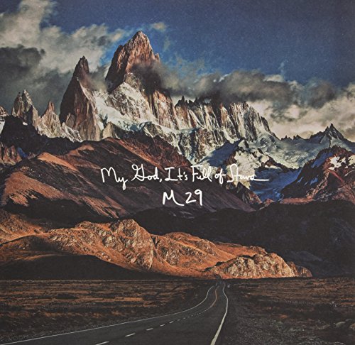 Album cover featuring a road leading toward snowyL snowy mountains with white handwritten text.