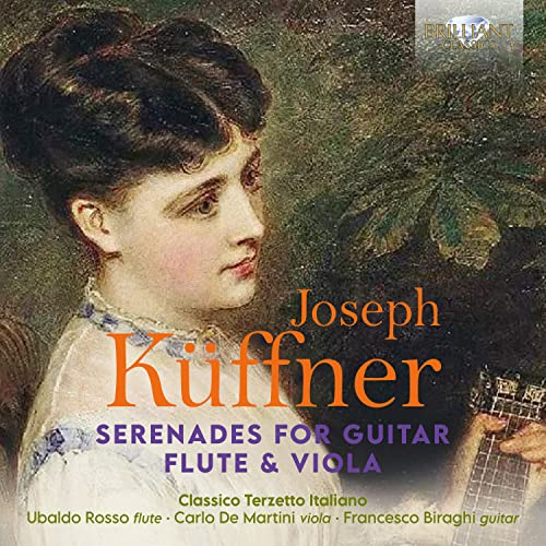 CD cover featuring a portrait of a woman and musical instruments.