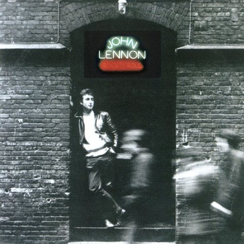 Black and white album cover featuring John Lennon with a blurred city scene.